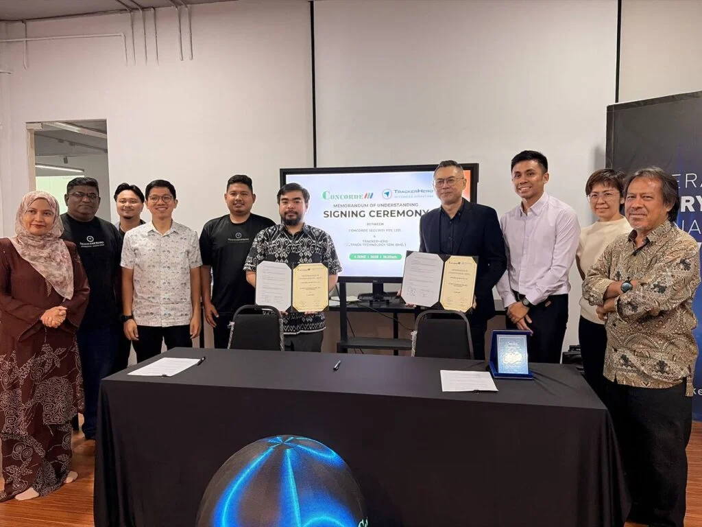 TrackerHero and Concorde representatives at their partnership signing